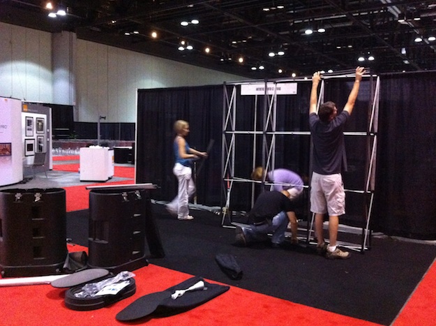 IMG_0499_A The team at Artistic Photo Canvas begins booth setup at Photoshop World in Orlando
